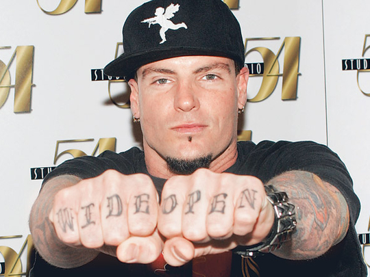 Does Vanilla Ice actually have a huge tattoo of himself on his back