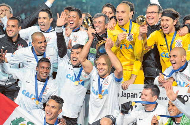 Brazillian Corinthian's players celebrate after winning the final match of  the FIFA Club World Cup against the England Premier League Chelsea at  Yokohama Stadium on Dec. 16, 2012. South American champions Corinthians
