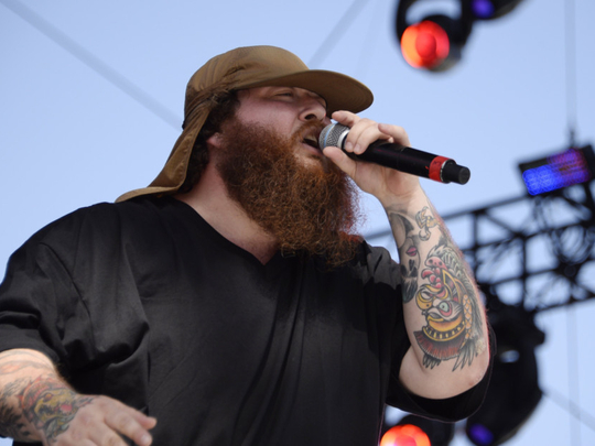 Rappers are mostly tattooed and the American rapper Action Bronson is no  exception. He has tattoos all over his body like here on his legs. Denmark  2013 Stock Photo - Alamy