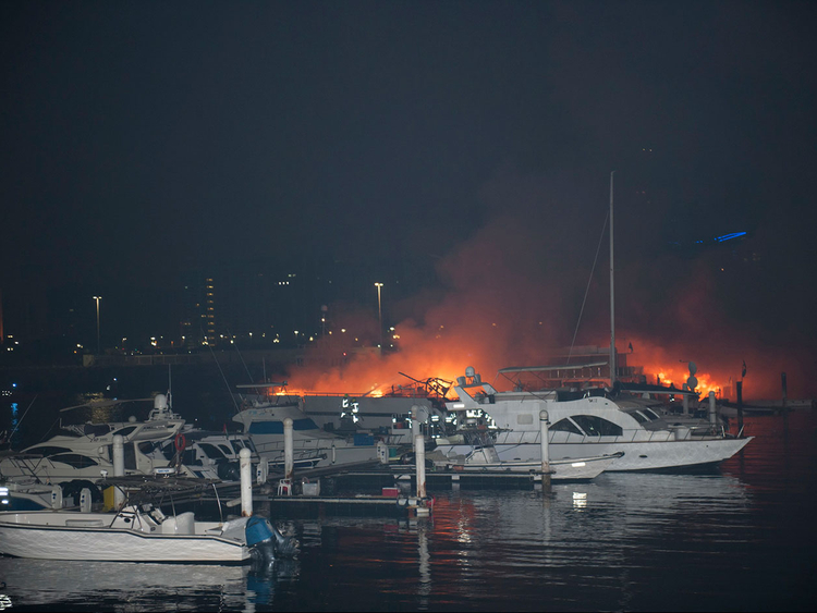 Abu Dhabi Marina fire: Eight boats damaged by flames | Government ...