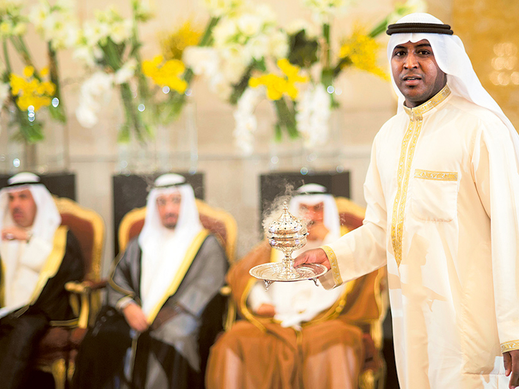 A Handsome Arab Groom Wearing A Traditional Bisht Uniform, A