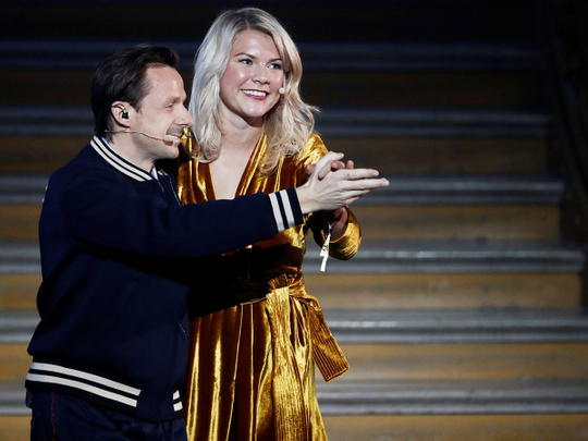 Ada Hegerberg (R) dances with French DJ and producer Martin Solveig