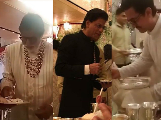 RDS_181215 Bollywood stars serve food at Ambani wedding