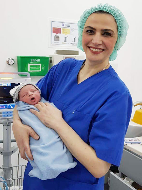 Dr Hala El Sayed Ali Hassan with baby Omar Joha.