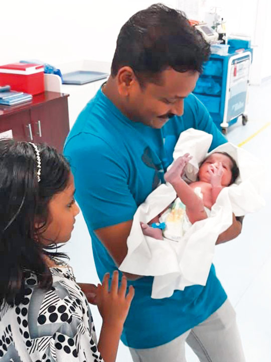 Rojan Joseph with his new born Baby Annliya Rojan.