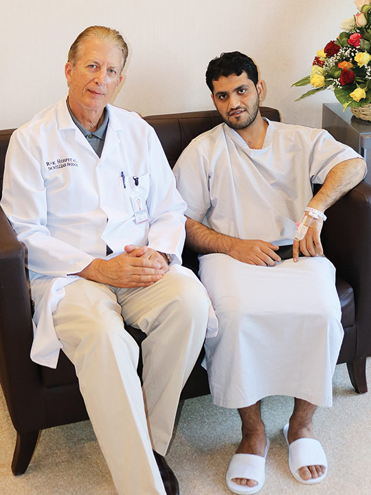 Mohammad Khan with Dr William Hodge