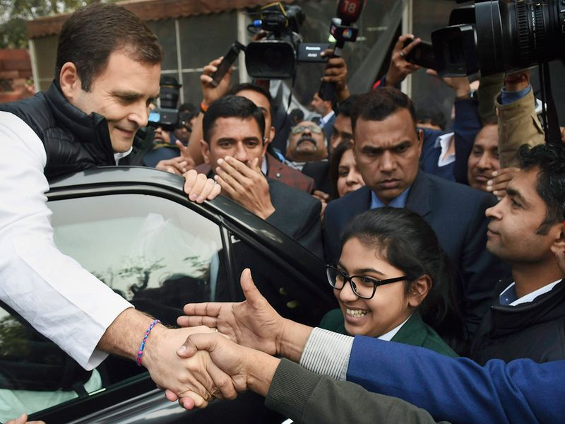 Rahul Gandhi greets the student visitors