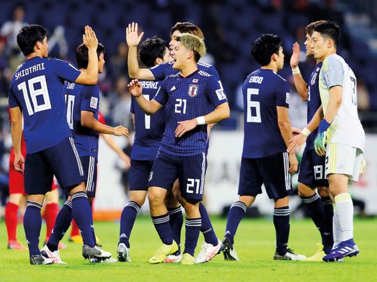 Japan's Ritsu Doan and team mates celebrate