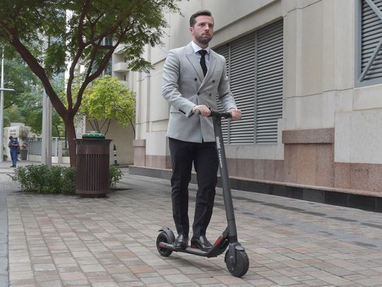 Neil Ormond with his electric scooter