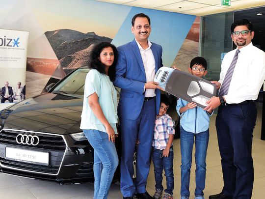 Renny Varghese is presented the Audi A4 car