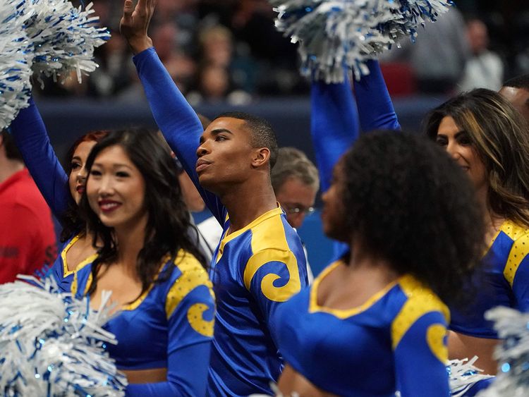 Los Angeles Rams cheerleaders on the field during a break in the