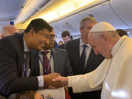 Alex Abraham greets the Pope