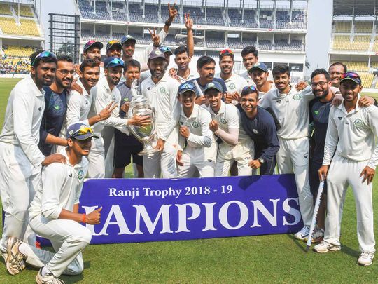 Vidarbha team poses with the trophy