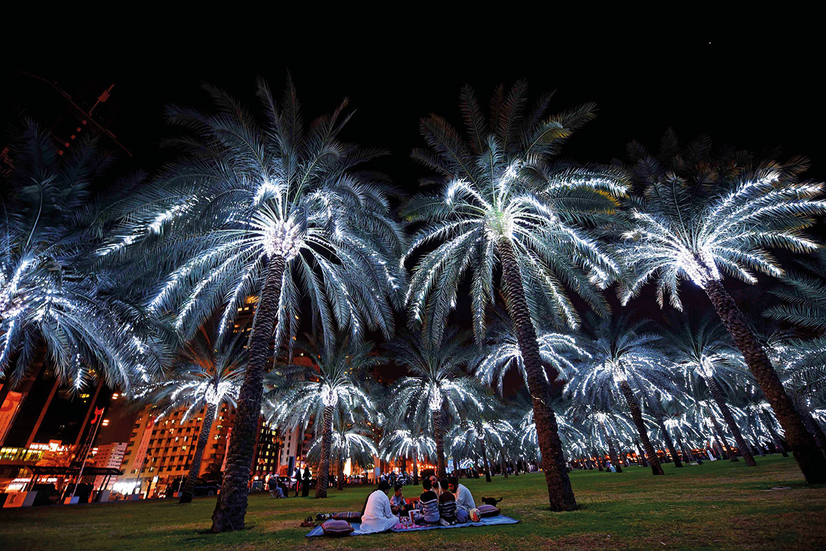 Families enjoy a night out at Buhairah Corniche Park