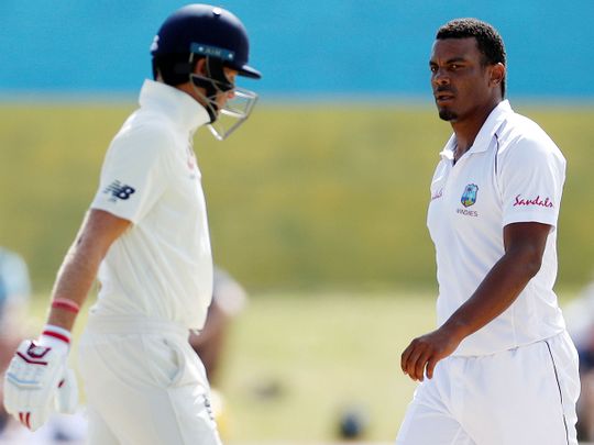 West Indies' Shannon Gabriel and England's Joe Root