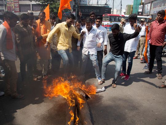 Bajrang Dal activists burn an effigy