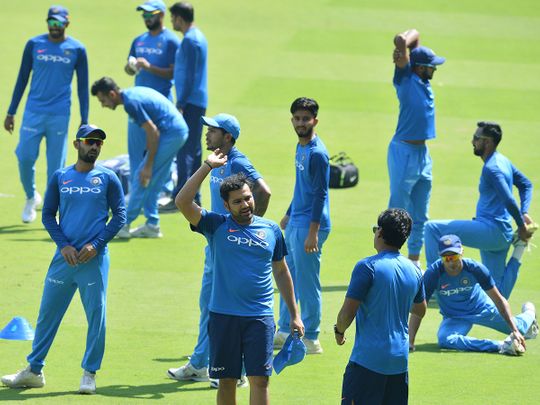 Indian cricketers take part in a practice session