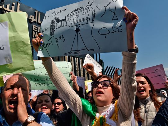 Algerian journalists take part in a demonstration