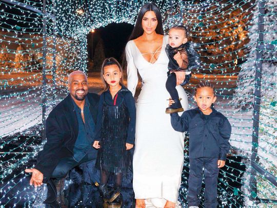 Kim and Kanye with their three children