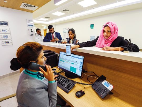 Staff catering to patients during rush-hour at Aster Hospital in Al Qusais