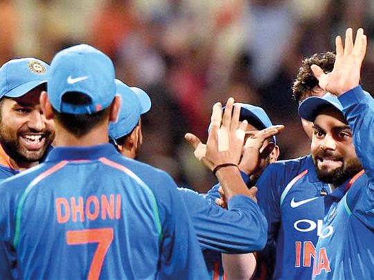 Indian captain Virat Kohli celebrates with teammates