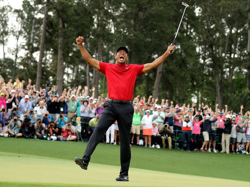 Tiger Woods celebrates