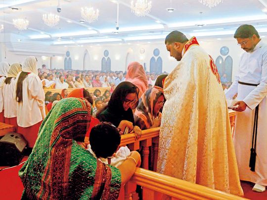 Christians attend the Easter Mass at the Dubai Mar Thoma Church 01