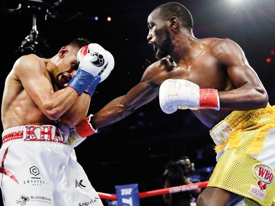 Terence Crawford punches Amir Khan