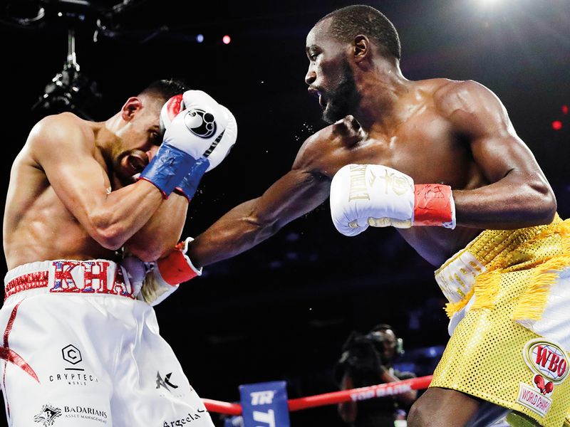 Terence Crawford punches Amir Khan