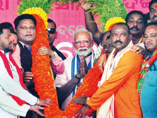 Prime Minister Modi being garlanded by BJP leaders