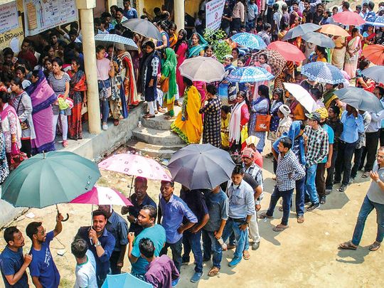 Voters wait in long queues
