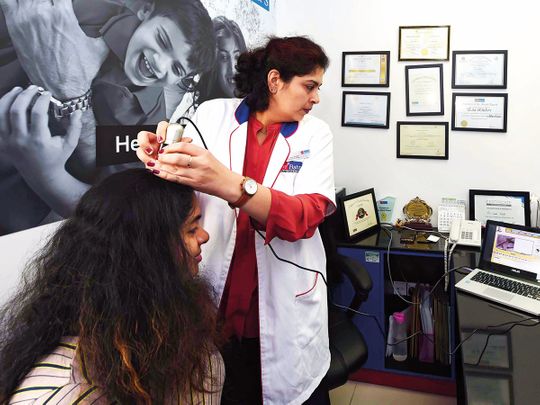 Dr. Usha Khatri giving treatment
