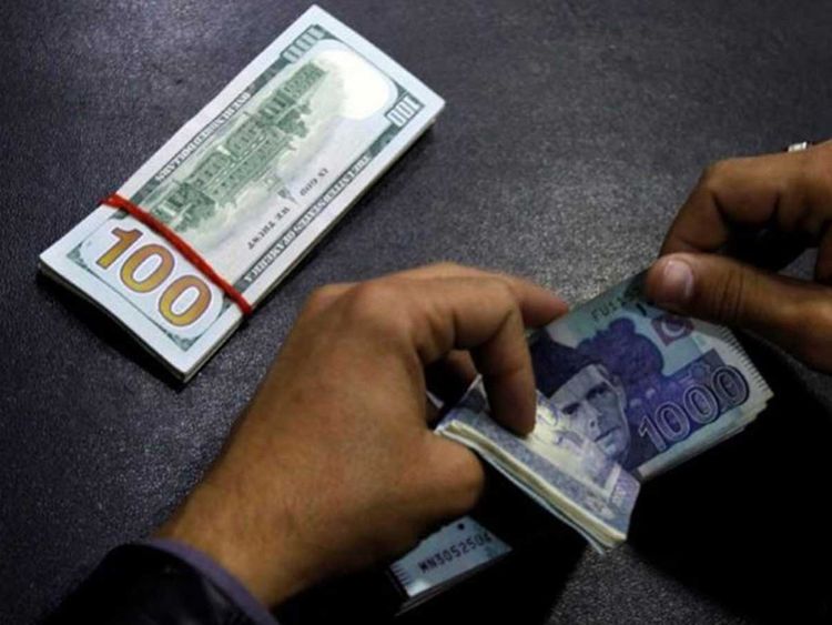 Pakistanis Ditch The Dollar As Rupee Plunges - 
