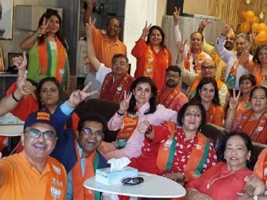 NRI supporters of Modi celebrating BJP victory in a Dubai villa