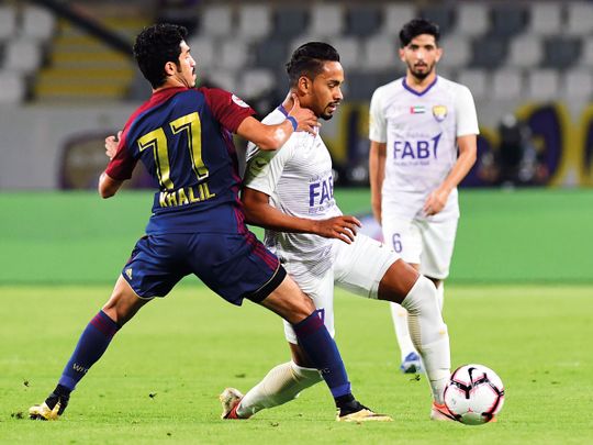 Action from the match between Al Wahda and Al Ain
