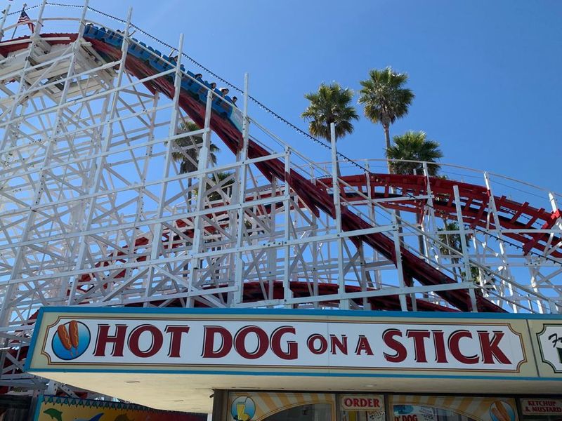 Hot dogs near a roller coaster