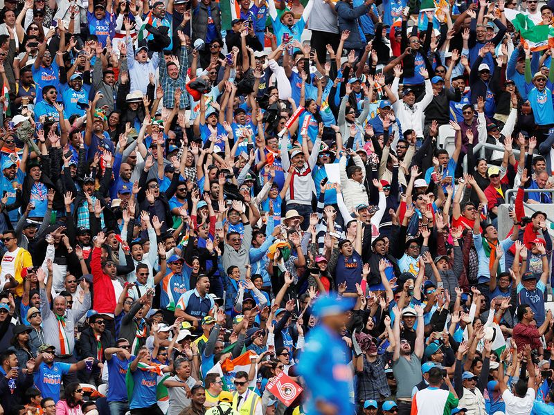 India fans celebrate during the match