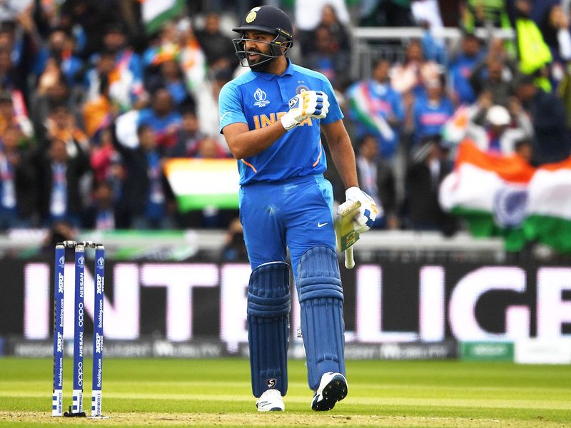 India's Rohit Sharma celebrates after scoring a century
