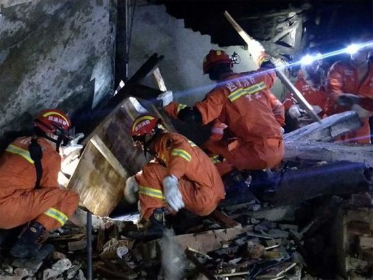 Rescuers search for earthquake survivors
