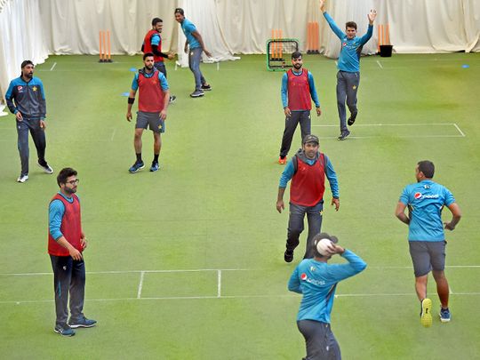 Pakistan players and support staff warm up