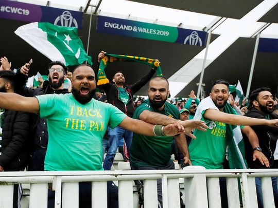 Pakistan fans cheer their team