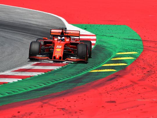  Ferrari's German driver Sebastian Vettel steers his car
