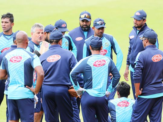 Bangladesh players listen to team coach Steve Rhodes