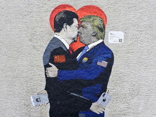 A mural entitled 'Smart Love' by Italien street artist TvBoy 