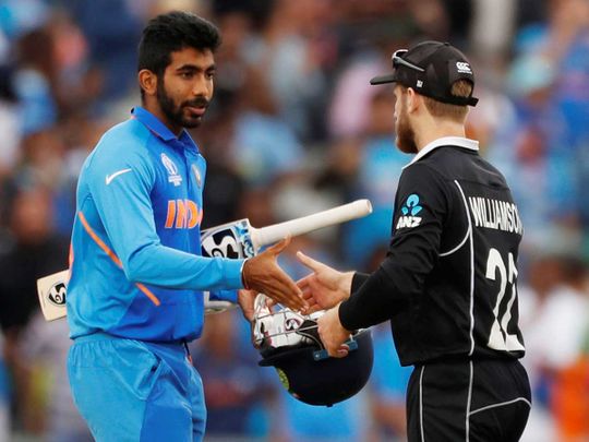  India's Jasprit Bumrah shakes hands with New Zealand's Kane Williamson