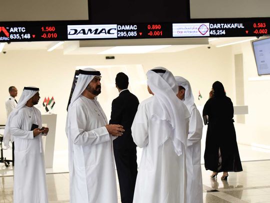 Traders at Dubai Financial Market (DFM).