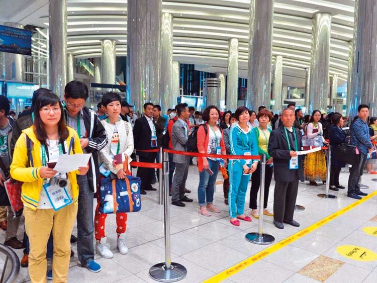 Chinese visitors at Dubai International Airport Terminal 3.