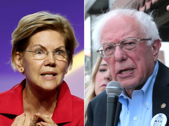 Democratic U.S. Presidential candidates Senator Elizabeth Warren, left, and Senator Bernie Sanders