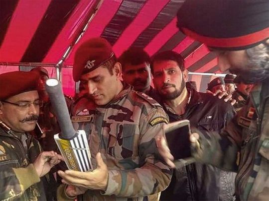 Image of MS Dhoni signing bat in south Kashmir goes viral