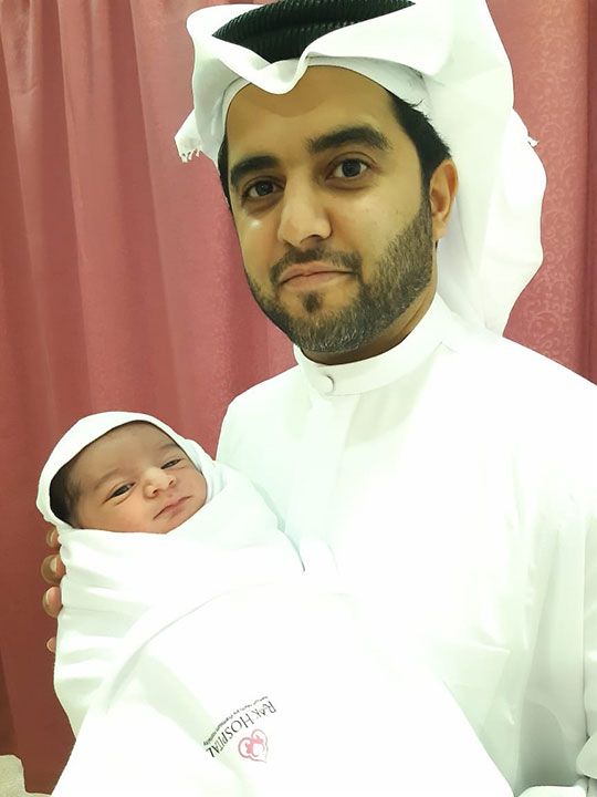 NAT-190811-Baby-boy-Saeed-with-Father-Abdulla-Mohammed-Saeed-AlHumaidi-Alkhanbouli-(Read-Only)